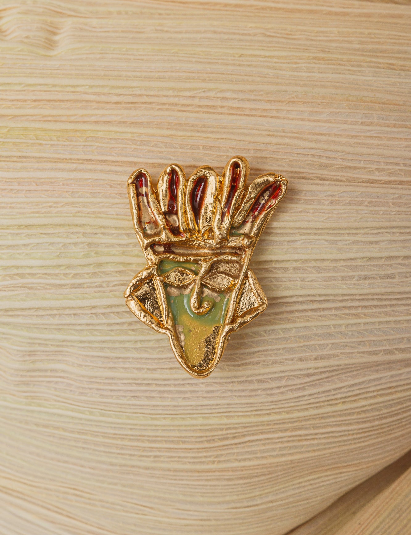Broche Rostro